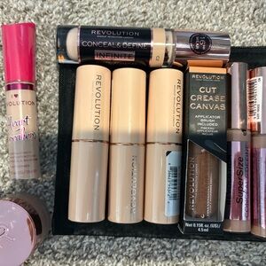 Revolution Concealer Makeup bundle and black make up bag
